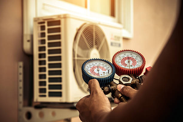 Professional Hvac technician working in South Hamilton, MA